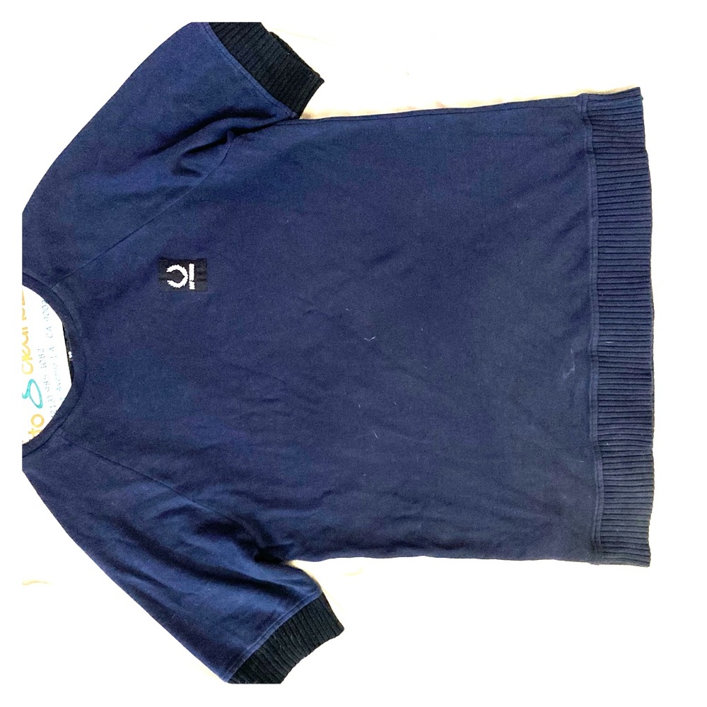 RAF SIMONS X FRED PERRY short sleeve sweatshirt.